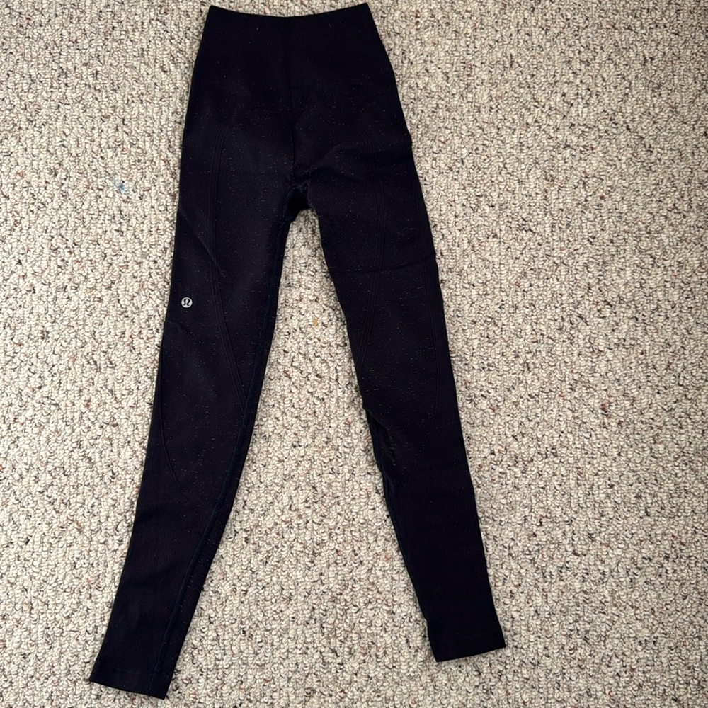 Lululemon leggings size 00 xxxs grayish black with white design